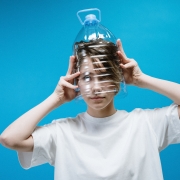 Canva Woman Wearing Plastic Bottle on Head 3